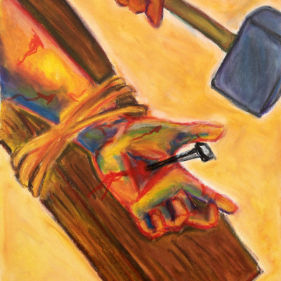Eleventh station of the cross. Jesus is nailed to the cross. Hand is shown being held down with n...